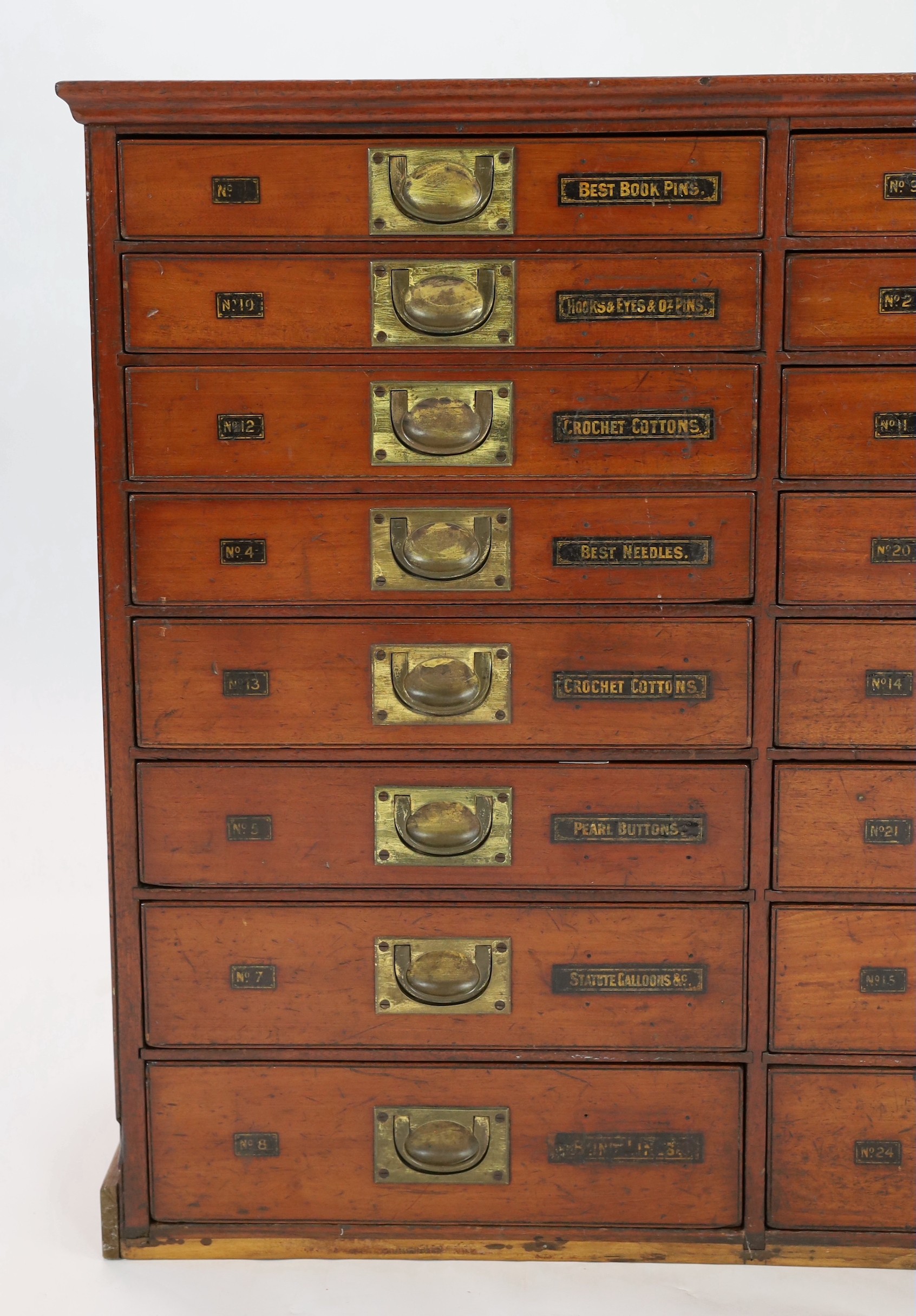 A Victorian mahogany haberdashery cabinet of twenty four drawers, width 136cm depth 35cm height 82cm